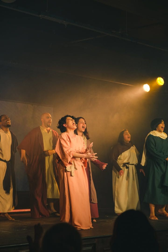 Performing arts expressing passionate worship and vocal talent on stage